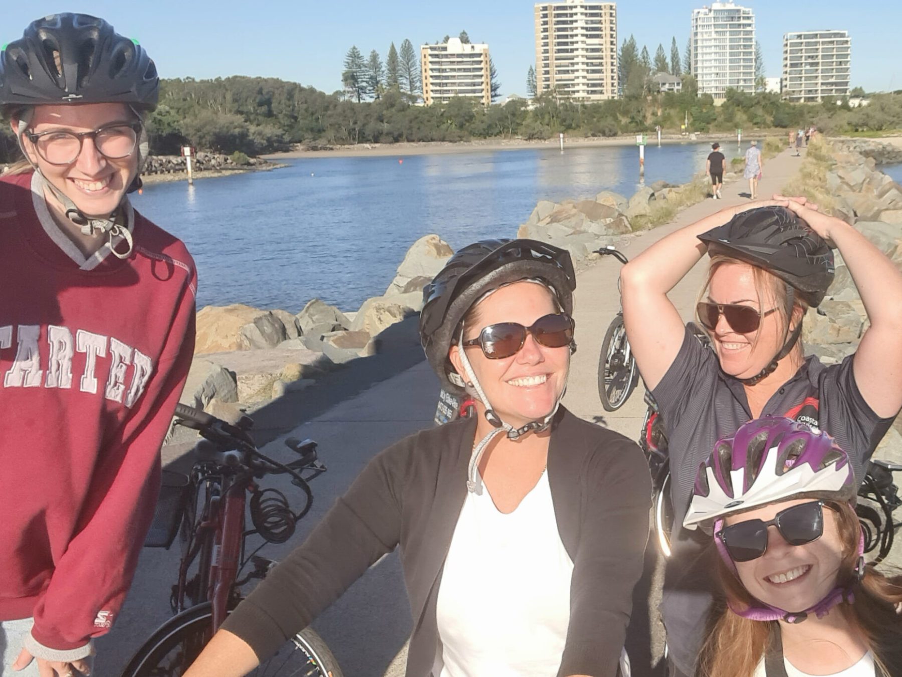 a couple of people that are standing in the water