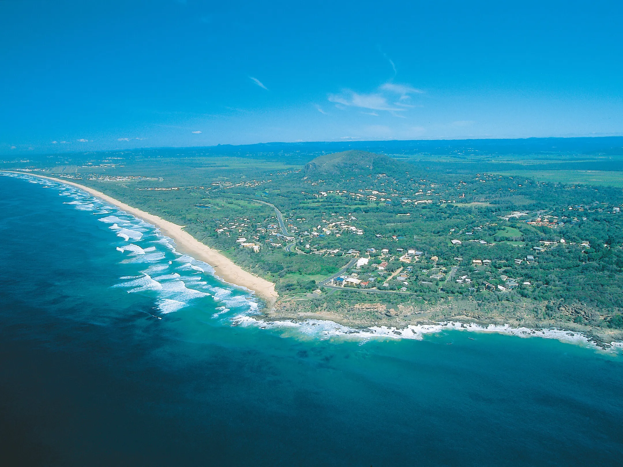 Aerial view of Point Arkwright and Mt Coolum, Sunshine Coast, Queensland, showcasing coastal beauty and pristine beaches. Photo courtesy of @VisitSunshineCoast.