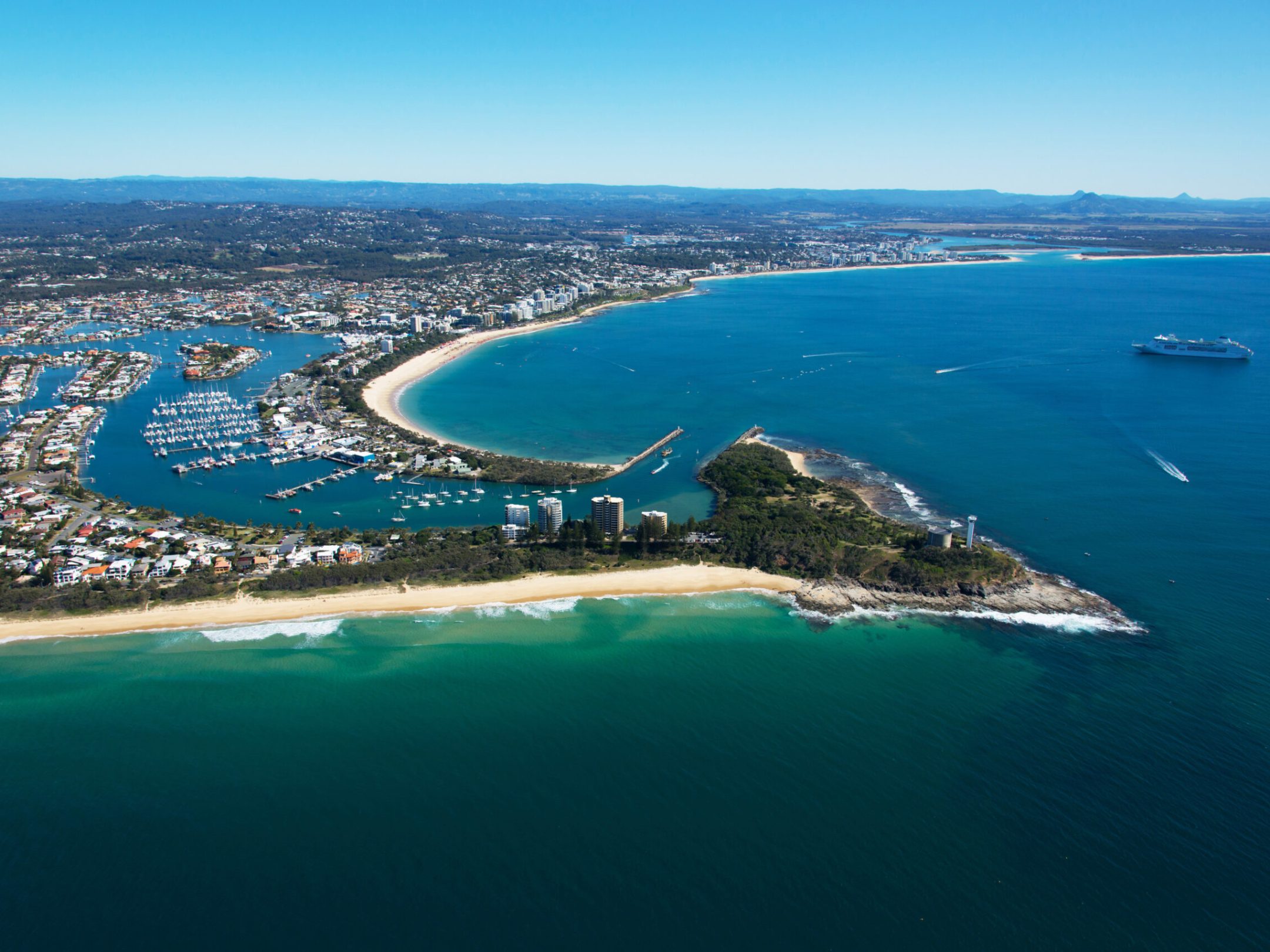 a view of a beach next to a body of water